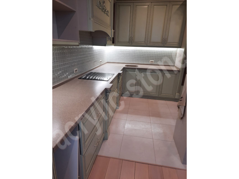 Угловая кухонная столешница  из искусственного камня с интегрированной мойкой Grandex: фото